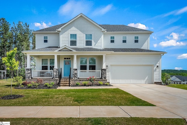 139 Ridgeline Row, Central, SC 29630 - craftsman-style home featuring an attached garage, covered porch, concrete driveway, a front lawn, and a shingled roof