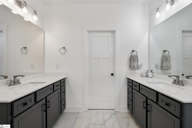 139 Ridgeline Row, Central, SC 29630 - bathroom featuring marble finish flooring, baseboards, and two vanities
