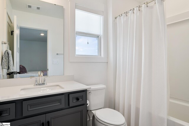 139 Ridgeline Row, Central, SC 29630 - ensuite bathroom featuring toilet, vanity, and shower / bath combination with curtain