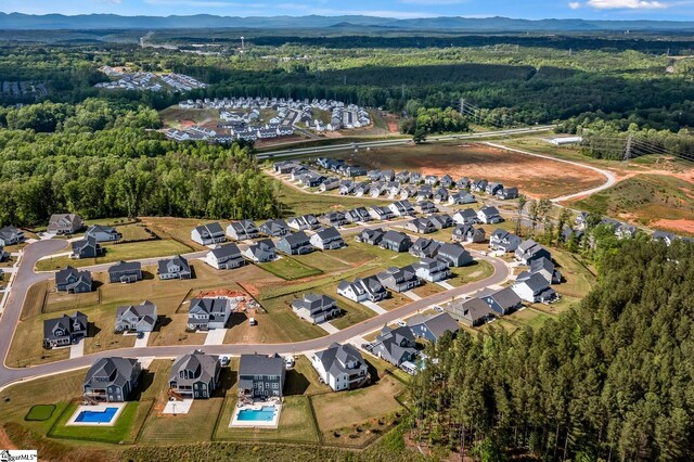 139 Ridgeline Row, Central, SC 29630 - aerial overview of property's location featuring a forest and a mountain backdrop