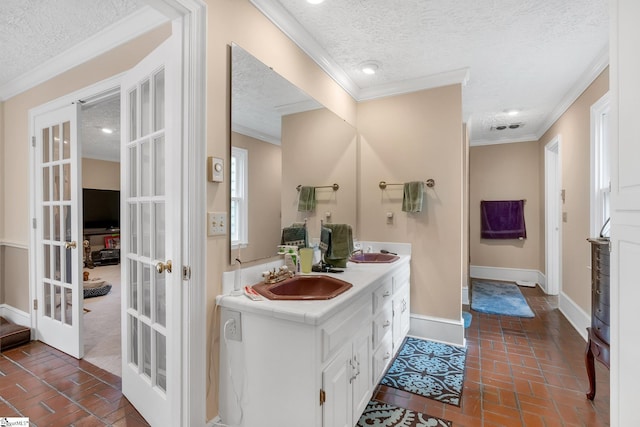 416 Ashley Downs, Anderson, SC 29621 - full bathroom with french doors, a textured ceiling, ornamental molding, baseboards, and brick flooring