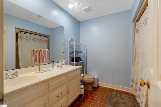 416 Ashley Downs, Anderson, SC 29621 - bathroom featuring toilet, double vanity, a textured ceiling, baseboards, and curtained shower