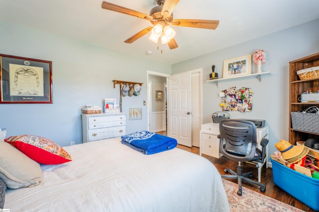 147 Daniel Dr, Easley, SC 29642 - bedroom featuring wood finished floors, a closet, a desk, and ceiling fan