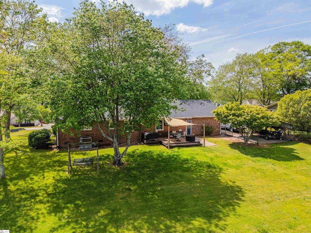 147 Daniel Dr, Easley, SC 29642 - view of green lawn featuring a wooden deck
