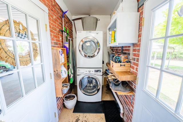 147 Daniel Dr, Easley, SC 29642 - washroom with stacked washer / drying machine and brick wall