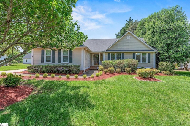 ranch-style house with a front lawn