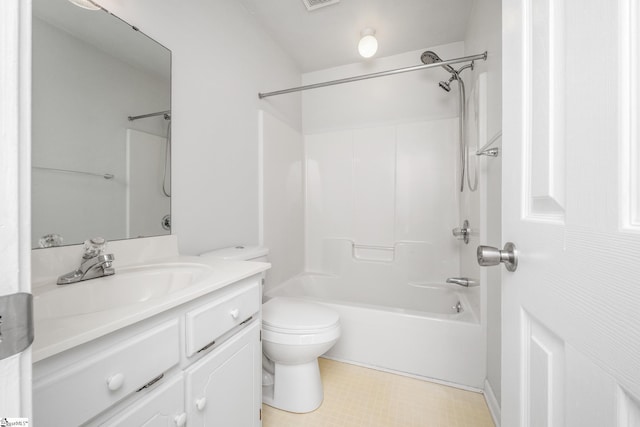 full bath with vanity, shower / bath combination, toilet, and tile patterned floors