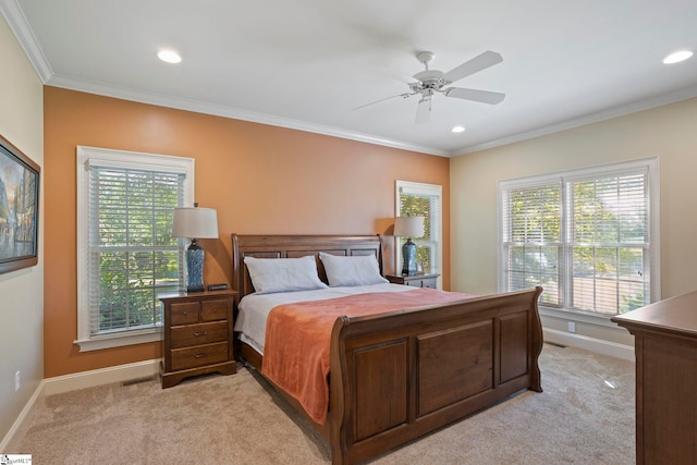 bedroom featuring light colored carpet, ornamental molding, baseboards, recessed lighting, and a ceiling fan