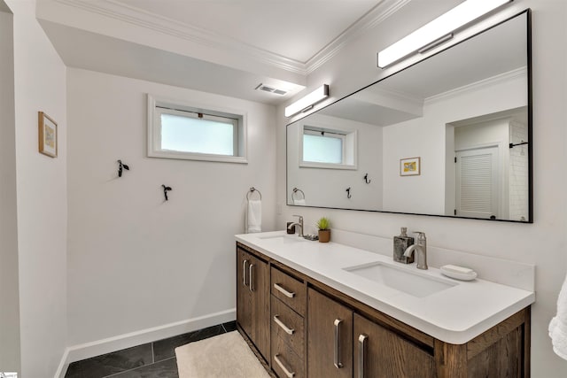 full bathroom featuring baseboards, crown molding, and double vanity