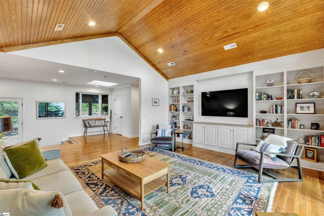 living room featuring wooden ceiling, wood finished floors, built in shelves, high vaulted ceiling, and baseboards