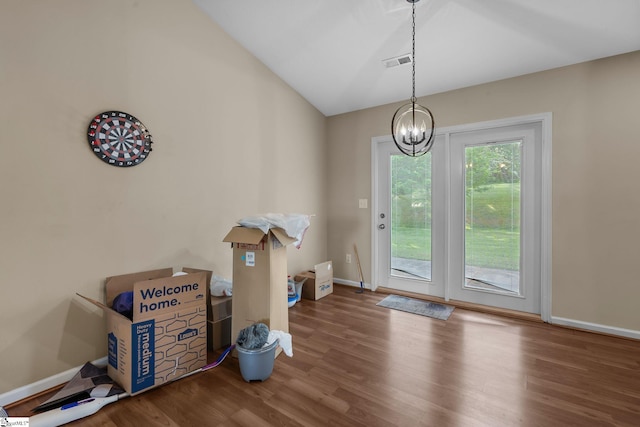 113 Glastonbury Dr, Greer, SC 29651 - unfurnished dining area featuring wood finished floors, a chandelier, and baseboards