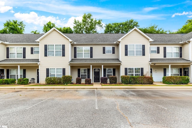 46 Ridgestone Cir, Mauldin, SC 29662 - townhome / multi-family property featuring uncovered parking, a porch, and a shingled roof