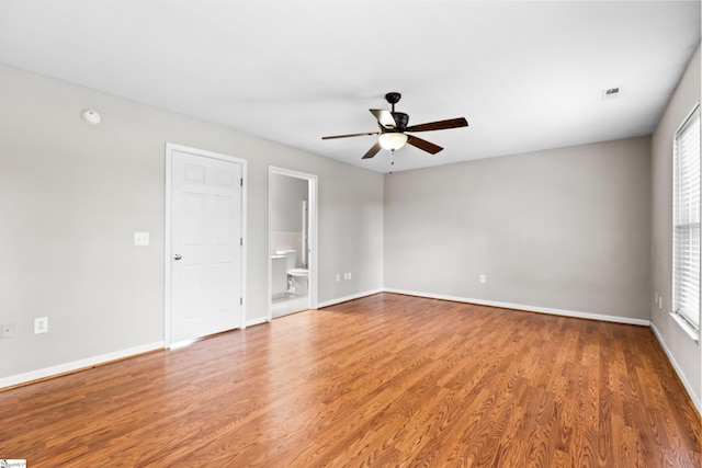 46 Ridgestone Cir, Mauldin, SC 29662 - empty room with ceiling fan, light wood finished floors, and baseboards