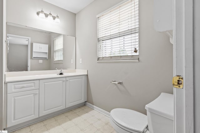 46 Ridgestone Cir, Mauldin, SC 29662 - half bath with tile patterned floors, toilet, plenty of natural light, and baseboards