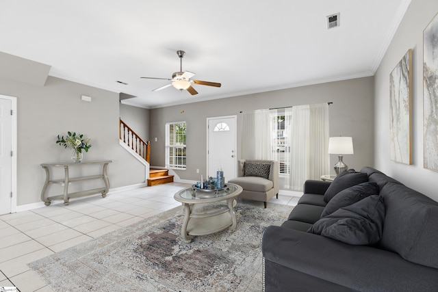 46 Ridgestone Cir, Mauldin, SC 29662 - living area with tile patterned floors, a ceiling fan, crown molding, stairs, and baseboards