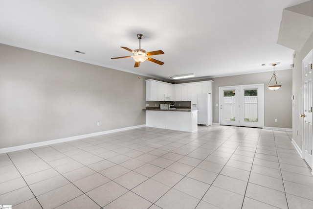 46 Ridgestone Cir, Mauldin, SC 29662 - unfurnished living room featuring a ceiling fan, light tile patterned floors, baseboards, and ornamental molding