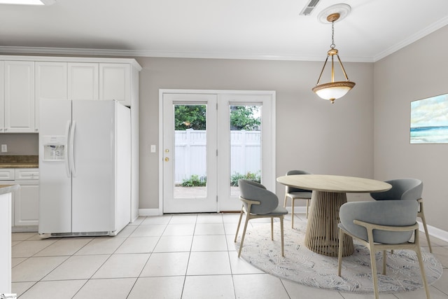 46 Ridgestone Cir, Mauldin, SC 29662 - dining area featuring ornamental molding, baseboards, and light tile patterned floors