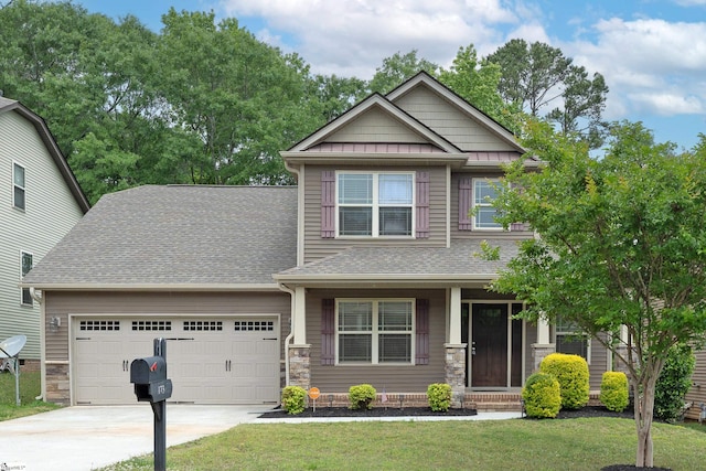 craftsman inspired home with a garage, driveway, a front lawn, a shingled roof, and a porch