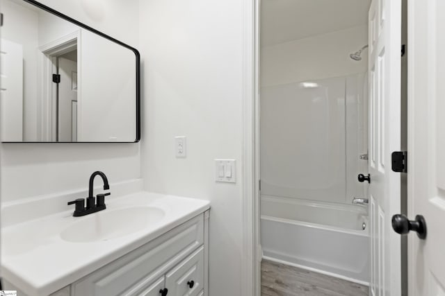 421 Wood Rd, Taylors, SC 29687 - bathroom featuring vanity, wood finished floors, and shower / washtub combination