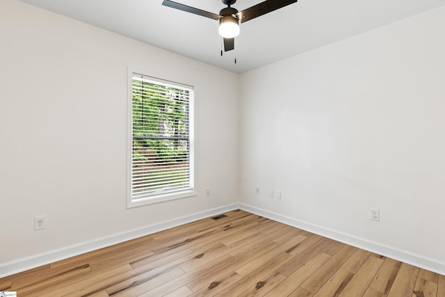 421 Wood Rd, Taylors, SC 29687 - empty room featuring baseboards, wood finished floors, and a ceiling fan