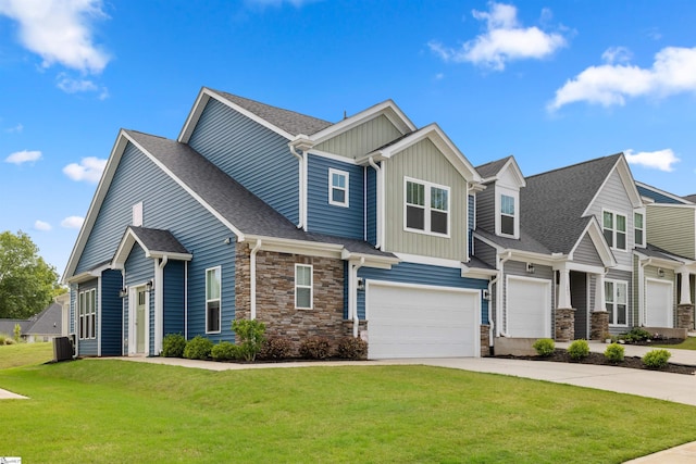 201 Rosecroft Dr, Easley, SC 29642 - craftsman-style house featuring an attached garage, stone siding, concrete driveway, a front lawn, and board and batten siding