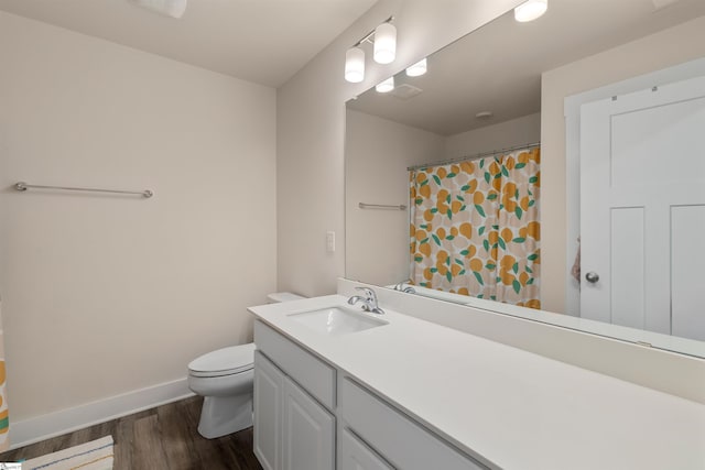201 Rosecroft Dr, Easley, SC 29642 - full bathroom with baseboards, wood finished floors, toilet, vanity, and a shower with curtain