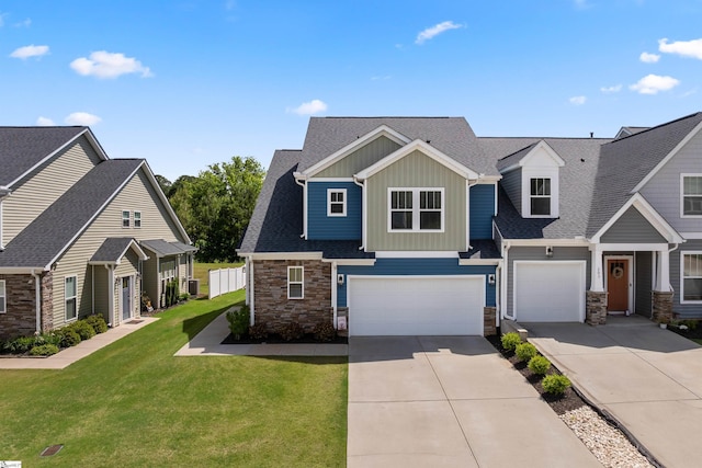 201 Rosecroft Dr, Easley, SC 29642 - craftsman inspired home with board and batten siding, stone siding, concrete driveway, a garage, and a front lawn