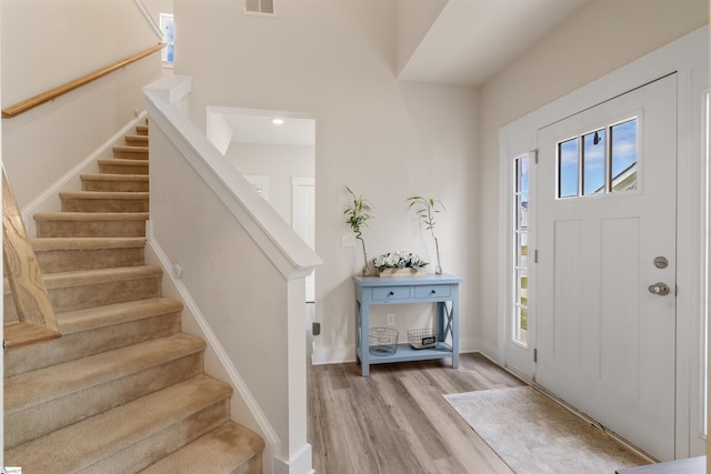 201 Rosecroft Dr, Easley, SC 29642 - foyer entrance with light wood-style floors, stairway, and baseboards