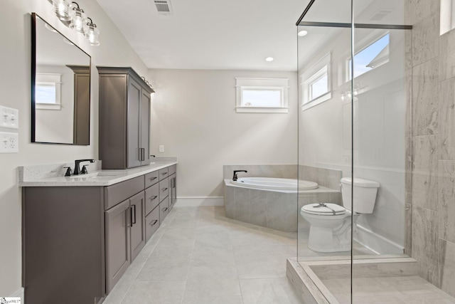 full bath featuring a bath, double vanity, baseboards, toilet, and a walk in shower