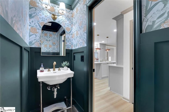 118 Briar Patch Rd, Anderson, SC 29621 - bathroom featuring wood finished floors, wallpapered walls, and a sink