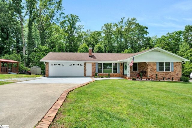 ranch-style home with a shed, concrete driveway, an attached garage, and brick siding