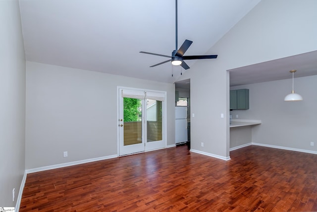 unfurnished living room featuring ceiling fan, wood finished floors, baseboards, and high vaulted ceiling