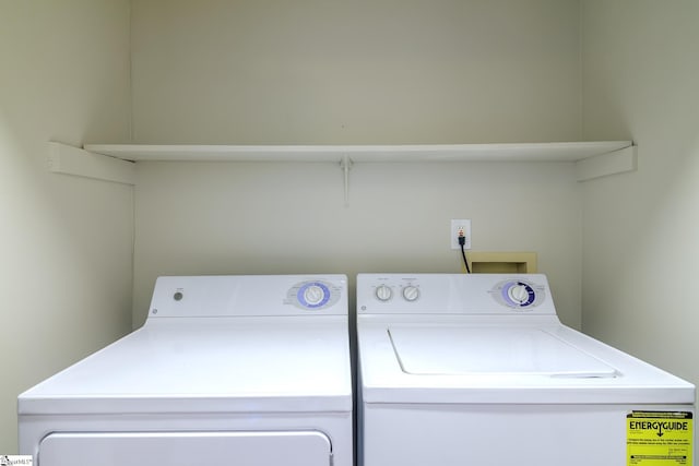 washroom with separate washer and dryer