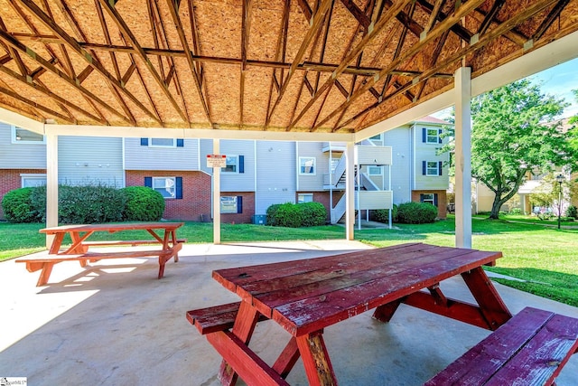 view of patio / terrace featuring stairs