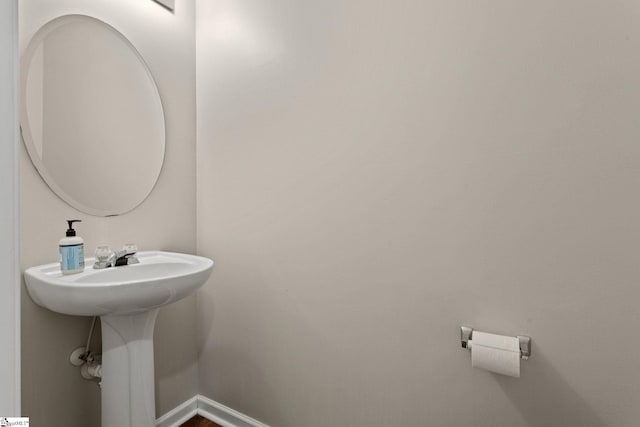 bathroom featuring baseboards