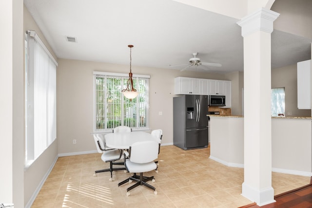 325 Waterton Way, Simpsonville, SC 29680 - dining space with ornate columns, ceiling fan, and baseboards