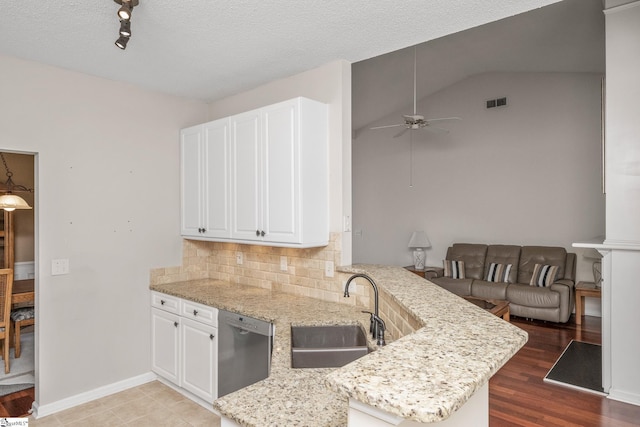 325 Waterton Way, Simpsonville, SC 29680 - kitchen with a sink, stainless steel dishwasher, a peninsula, light stone countertops, and ceiling fan