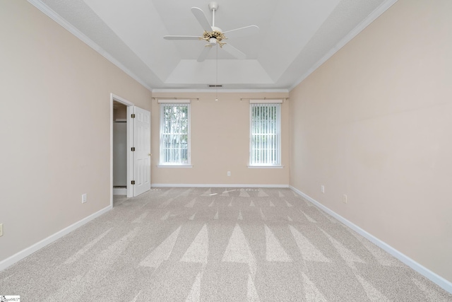 325 Waterton Way, Simpsonville, SC 29680 - unfurnished room featuring a raised ceiling, a ceiling fan, light carpet, baseboards, and ornamental molding