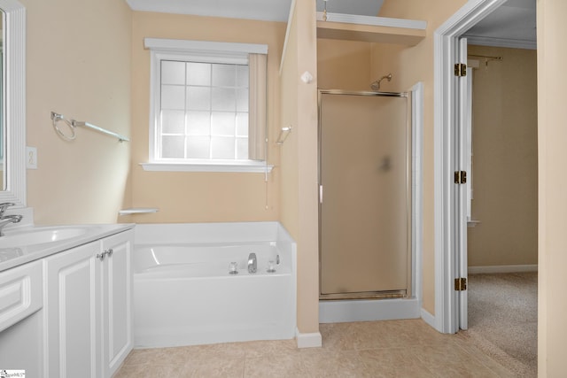 325 Waterton Way, Simpsonville, SC 29680 - full bath featuring a stall shower, a bath, vanity, tile patterned flooring, and baseboards