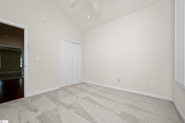 325 Waterton Way, Simpsonville, SC 29680 - unfurnished bedroom featuring attic access, carpet flooring, high vaulted ceiling, baseboards, and a closet