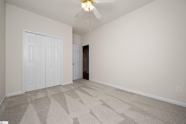 325 Waterton Way, Simpsonville, SC 29680 - unfurnished bedroom featuring light colored carpet, baseboards, a closet, and a ceiling fan