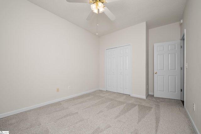 325 Waterton Way, Simpsonville, SC 29680 - unfurnished bedroom featuring light colored carpet, baseboards, a closet, and a ceiling fan