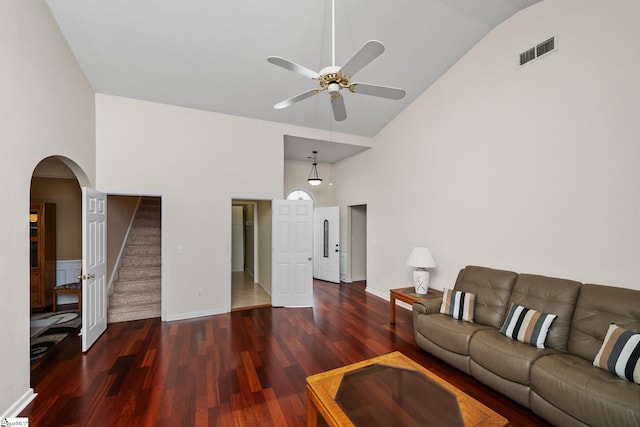 325 Waterton Way, Simpsonville, SC 29680 - living area with high vaulted ceiling, wood finished floors, a ceiling fan, arched walkways, and stairway