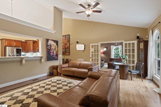 6 Pebble Stone Ln, Taylors, SC 29687 - living room featuring ceiling fan, light wood finished floors, high vaulted ceiling, french doors, and baseboards