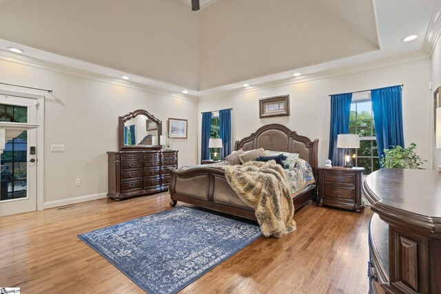 6 Pebble Stone Ln, Taylors, SC 29687 - bedroom featuring wood finished floors, crown molding, a towering ceiling, baseboards, and recessed lighting