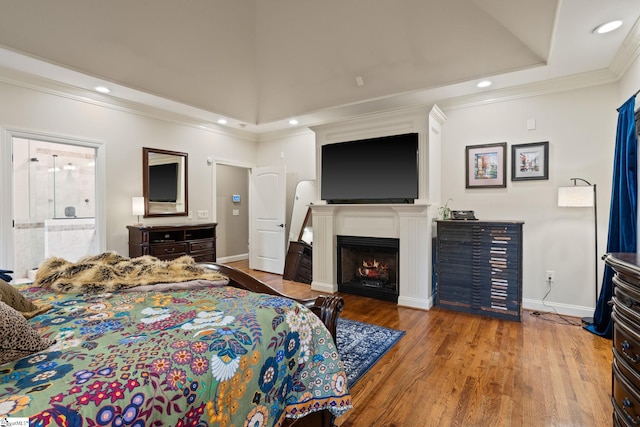 6 Pebble Stone Ln, Taylors, SC 29687 - bedroom featuring a lit fireplace, recessed lighting, baseboards, wood finished floors, and ornamental molding