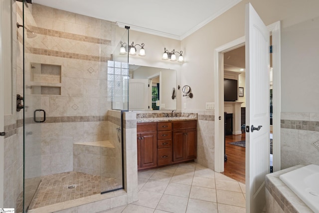 6 Pebble Stone Ln, Taylors, SC 29687 - full bath featuring tile walls, tile patterned flooring, a shower stall, ornamental molding, and vanity