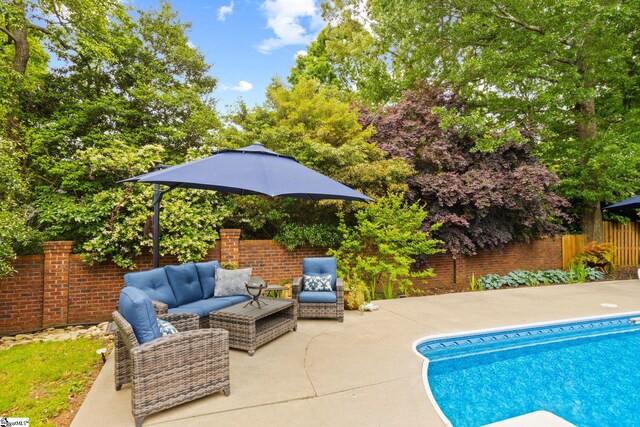 6 Pebble Stone Ln, Taylors, SC 29687 - view of pool featuring a patio area, fence, and an outdoor living space