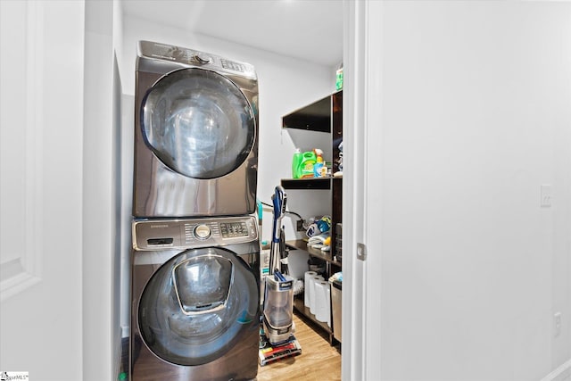 204 Maplestead Farms Ct, Greenville, SC 29617 - washroom with stacked washing machine and dryer and wood finished floors