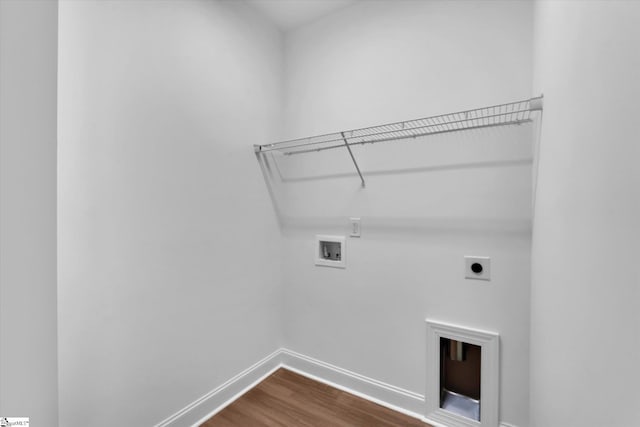107A W Stewart St, Pelzer, SC 29669 - washroom featuring washer hookup, electric dryer hookup, baseboards, and dark wood-style flooring